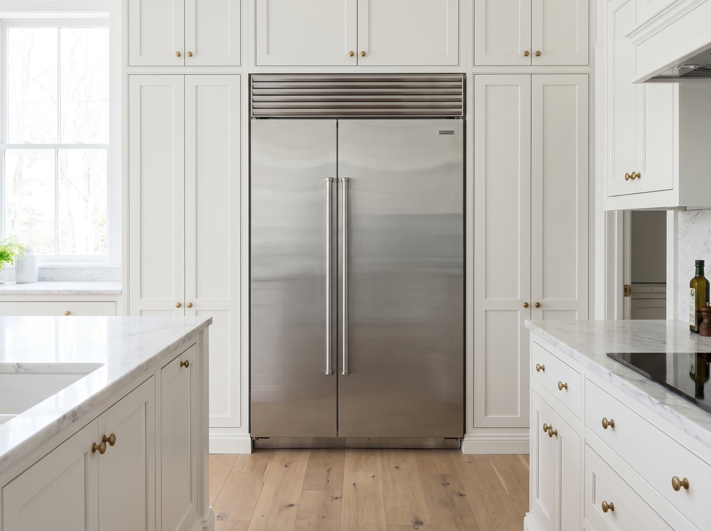 A built-in Sub-Zero refrigerator in a luxury kitchen